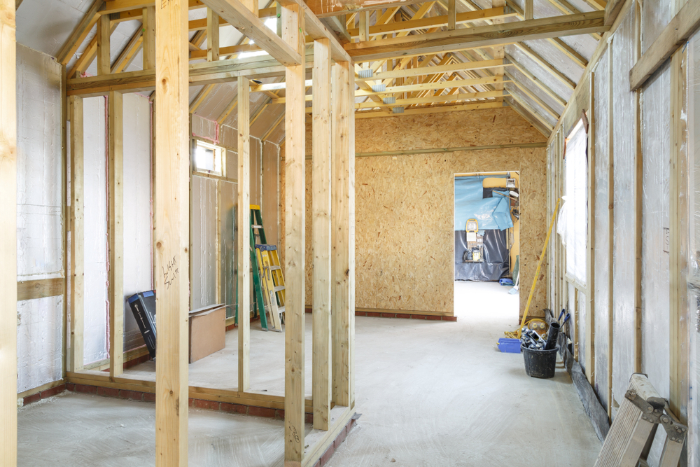 Reigate builder constructing internal timber stud walls during home renovation