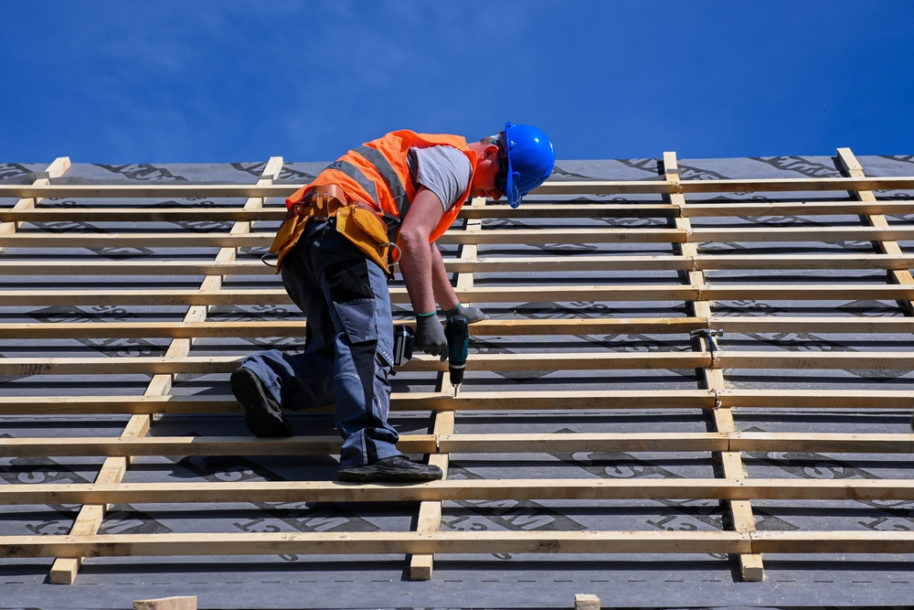 Sussex loft extension under construction with new roof structure and timber battens